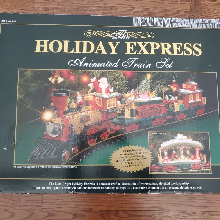 The HOLIDAY EXPRESS Animated Christmas Train Set In Box for Sale