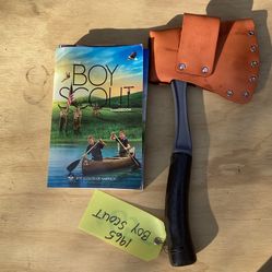Official Boy Scout handbook and Boy Scout hand Ax.