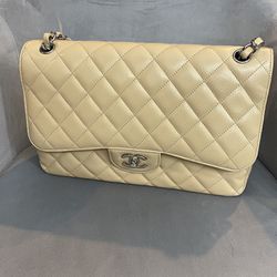 CHANEL Beige Quilted Caviar Leather Jumbo Classic: Double Flag Bag