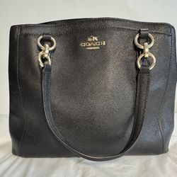 Coach Black Handbag With Gold Monogram And Hardware