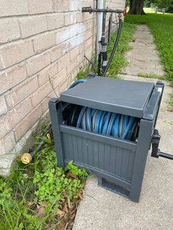 50 ft water hose and storage unit