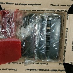 Scented blocks of wax (black and a few red)