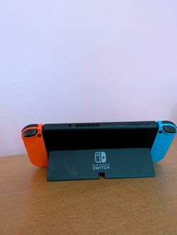Nintendo Switch with Neon Joy-Con Controllers