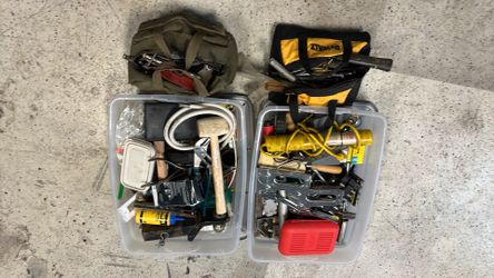 Plastic bum and tool bags with misc tools