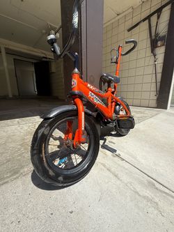 Orange Schwinn Child Training Bicycle