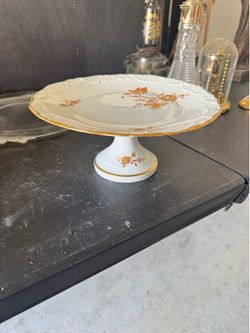 Limoges France porcelain cake stand, often referred to as a "compote" or "footed serving plate".