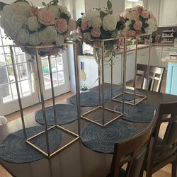 Floral arrangements centerpieces and table stands