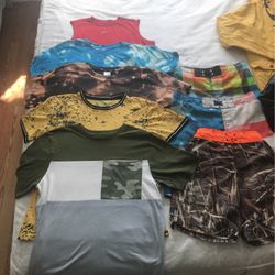 Boys Shirts, Swimsuits, Shorts, and Jackets. Sizes Varying from 7-8 To 12 (Small)  Some Used Some Brand New
