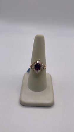 10k gold ring with red CZ
