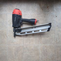 21° Framing nailer. Used Once.  Half Of The Box Of Nails Also Included 