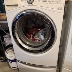 Whirlpool washer and dryer with stands/storage