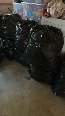 Assorted Woman’s Clothes And Shoes