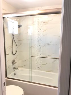 Slider door shower glass