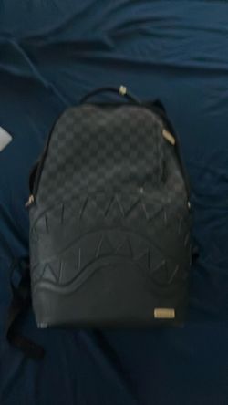 Spray ground backpack