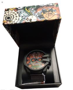 Ed Hardy colorful skull dial in mesh strap.