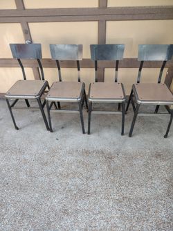 4 sturdy metal chairs