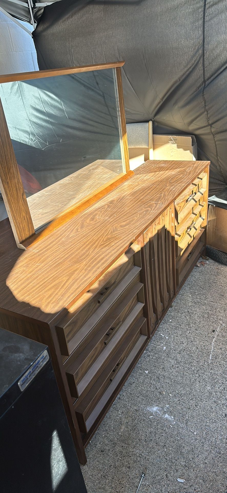 Vanity With A Mirror And Cabinets