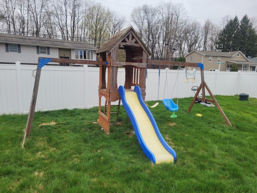 Back yard wooden swing set
