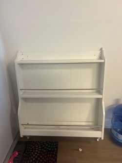 Shelf with bottom hooks for bags or coats