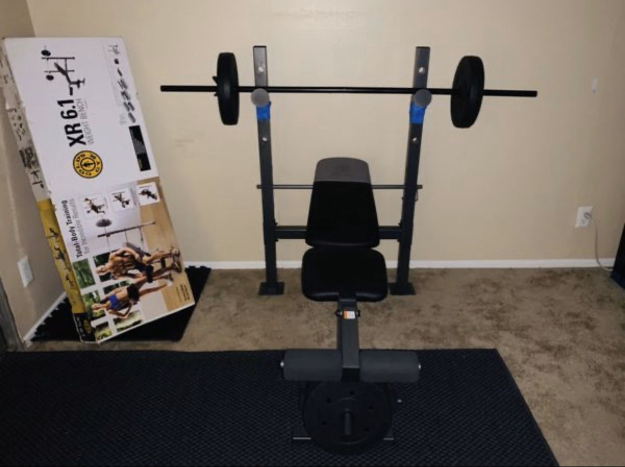 Gold Gym Bench and Bar with weighted plates 50lbs(10s,15s,25s)