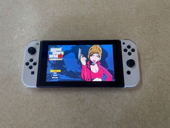 NINTENDO SWITCH V2 + 125 SWITCH GAMES and 7000 RETRO GAMES