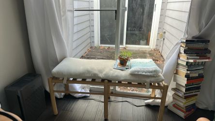 Bench with cushion.