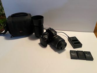 Nikon d3100 w/ 2 lenses batteries and bag