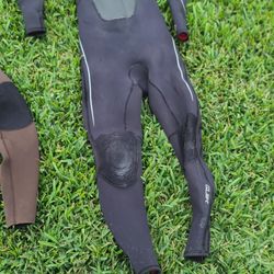 Boys Tall Wetsuit (Black) & Adult Medium Wetsuit (Brown)