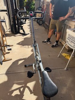 Rowing Machine with Monitor squat trainer