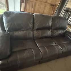 Large faux leather Sofa/couch With reclining Seats