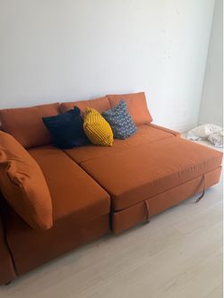 Burnt Orange Sleeper Sectional w/ Storage – Pulls Out to Bed, Good Condition!