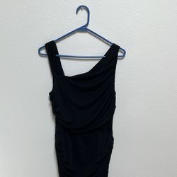 Black, sleeveless dress with see-through, cut out on the side Black, sleeveless dress with see-through, cut out on the side