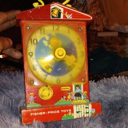 Fish  Price music box teaching clock