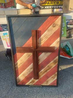 Handcrafted Wooden Cross On American Flag Backdrop