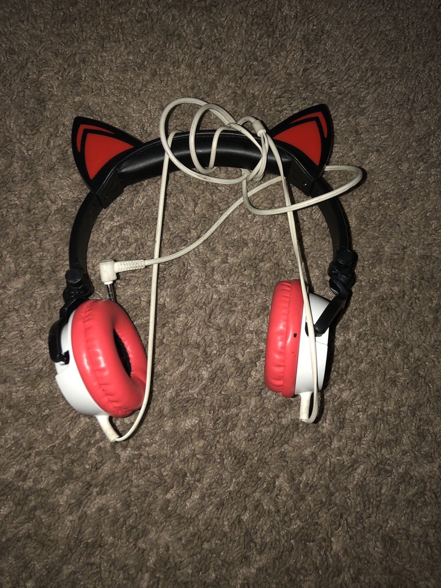 Red white and black cat Sony adjustable corded headphones