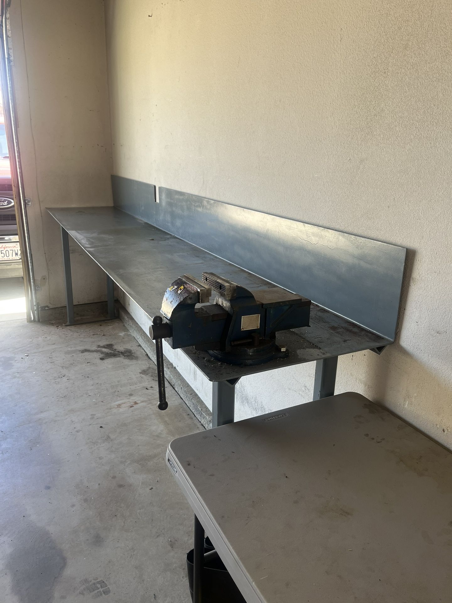 heavy metal bench and large vise.