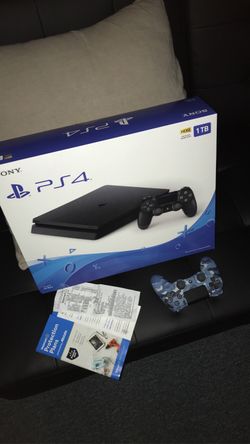 Brand new PS4 1tb with extra controller