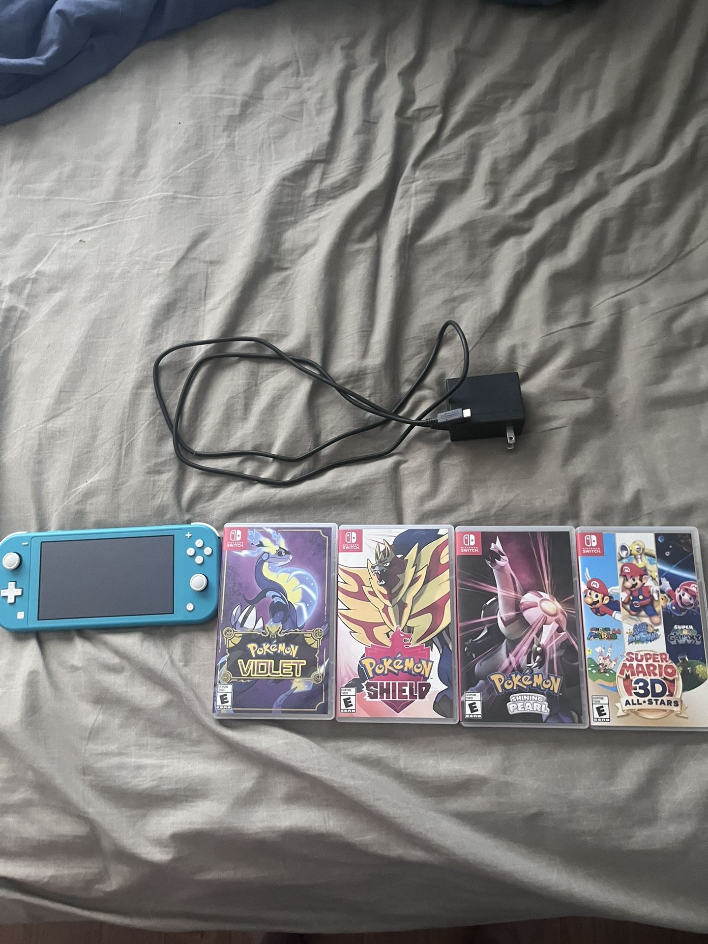 Nintendo Switch Lite + Games