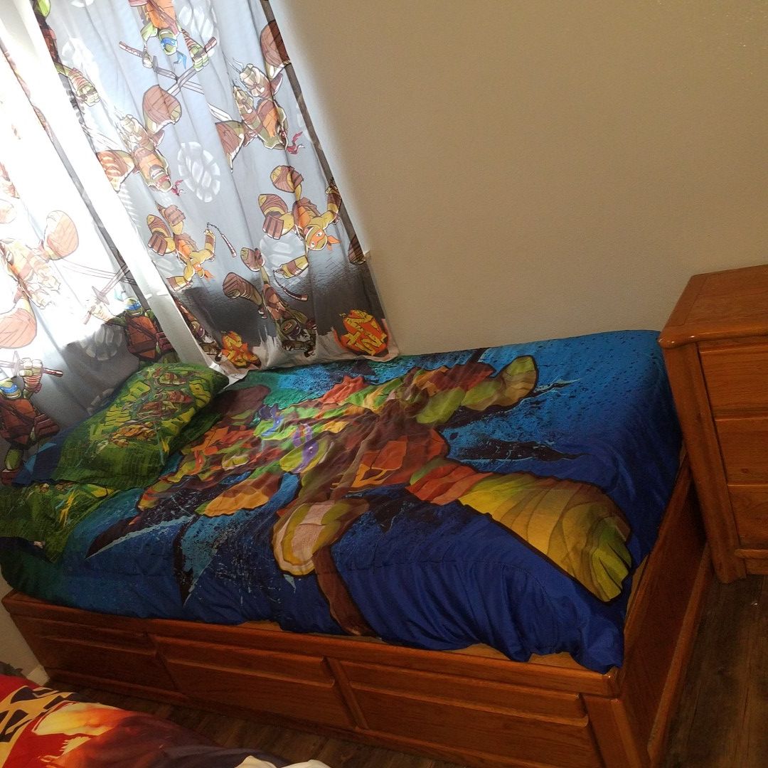 Twin bed frame with 3 drawer and Night stand as dresser,solid& havy material, Brown light color,matress is not incluide,pick up only, cash only.