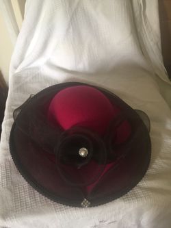 Woman's pink and black hat