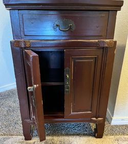 Small cherry wood colored cabinet in great condition