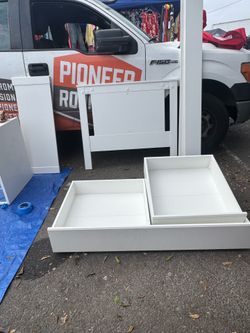 Twin bed with two storage drawers
