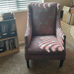 Wing Back Gray And Red Chair bought 5 Years Ago