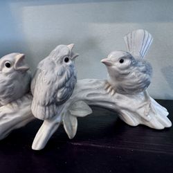Italy. Ceramic bisque birds perched on branches Gift Ideas 