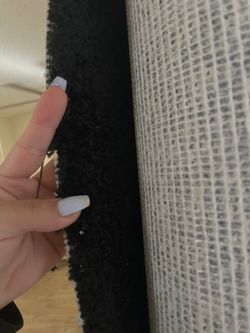 Black plush rug