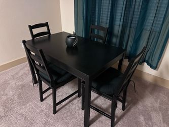 Black table and chairs
