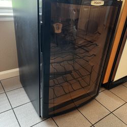 Haier HVFM20AB 18-Bottle Wine Cellar, With Contoured Smoked Glass Door