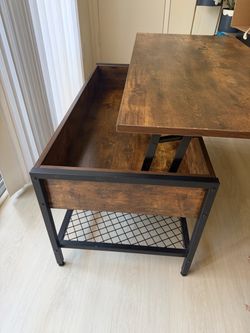 Coffee table with lift top