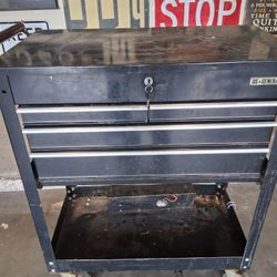 Mechanics 4 drawer US general toolcart with tools.
