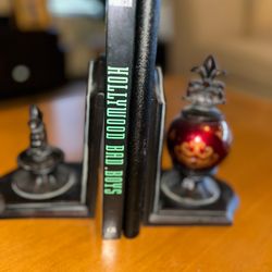 2 Book Ends. Use as set or separately. These are well made and weighted. Both for $10.